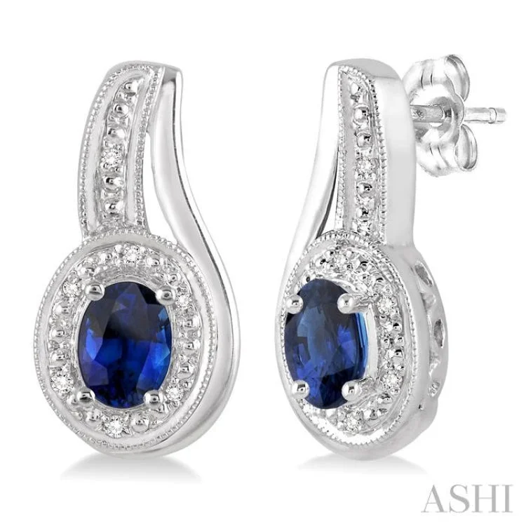 Gold Earrings for Formal Occasions-5x3 MM Oval Cut Sapphire and 1/50 Ctw Round Cut Diamond Earrings in Sterling Silver