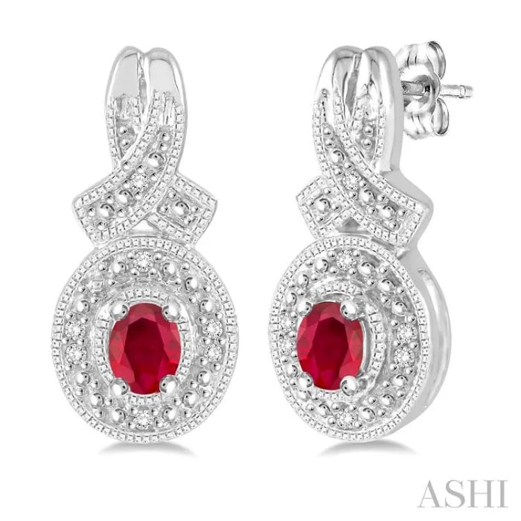 Fashionable Earrings for Parties-4x3 mm Oval Cut Ruby and 1/20 ctw Single Cut Diamond Earrings in Sterling Silver