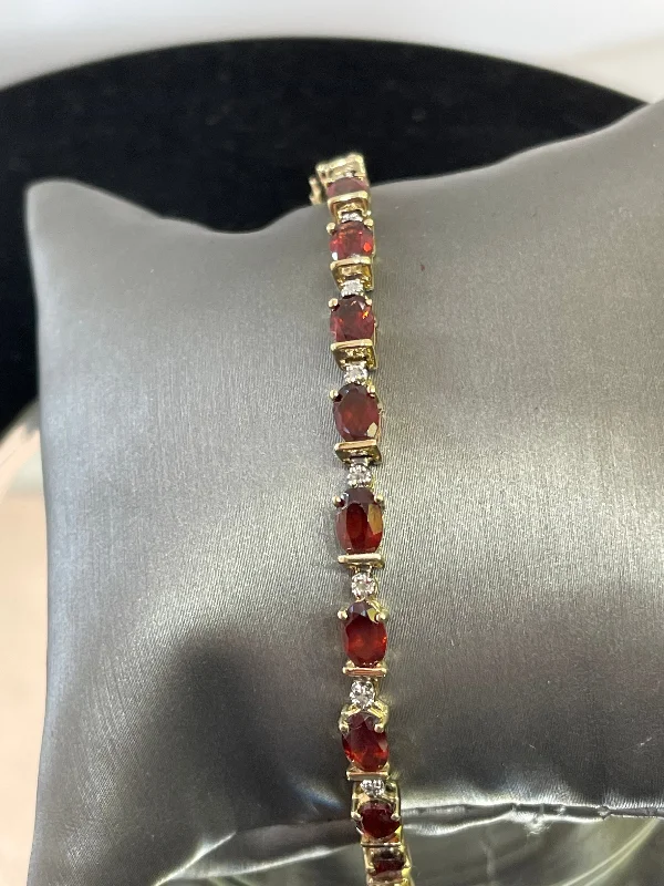 Handcrafted Beaded Bracelet for Women-14KT Y/G Oval Garnet And Diamond Tennis Bracelet