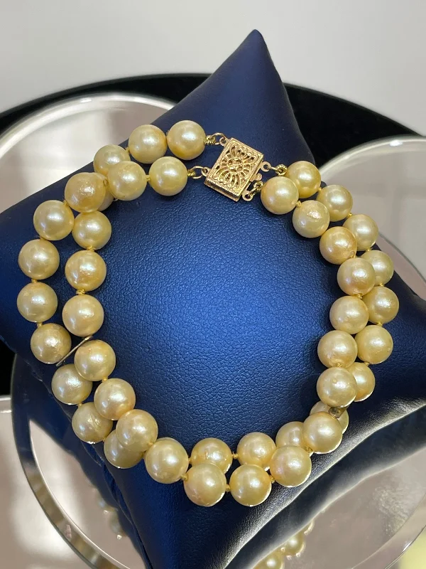 Vintage Style Bracelet with Charms-14 KARAT YELLOW GOLD AND DOUBLE STRAND PEARL BRACELET