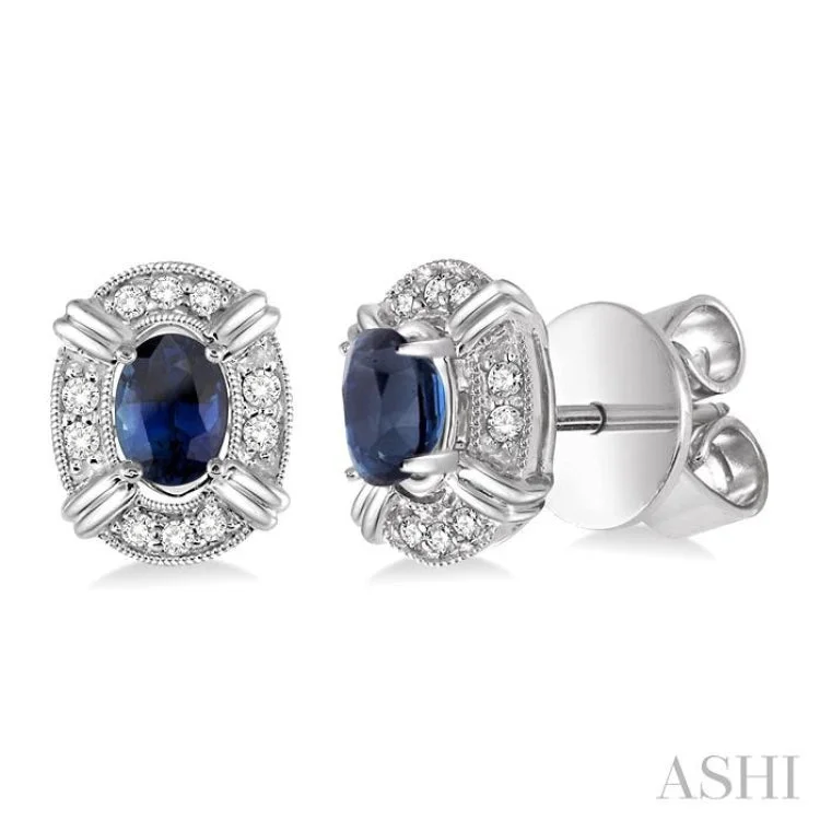 Elegant Stud Earrings for Casual Wear-5x3 MM Oval Cut Sapphire and 1/10 Ctw Single Cut Diamond Earrings in 10K White Gold