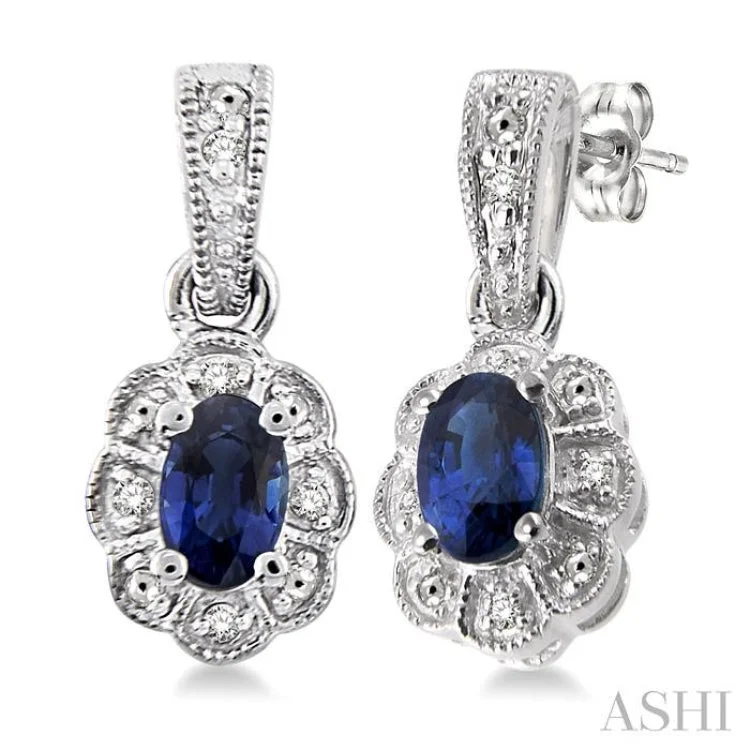 Elegant Earrings for Bridal Parties-5x3 mm Oval Cut Sapphire and 1/20 ctw Single Cut Diamond Earrings in Sterling Silver