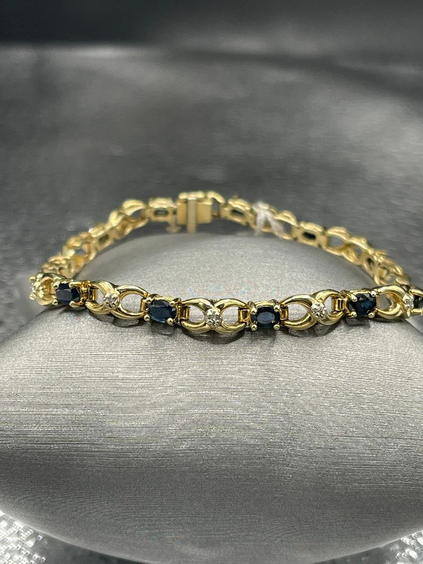 Custom Bracelets for Personalized Gifts-14 Karat Yellow Gold Sapphire And Diamond Bracelet